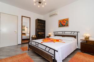 Posteľ alebo postele v izbe v ubytovaní Apartment Veve