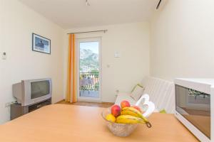 TV a/nebo společenská místnost v ubytování Apartments Zecic
