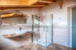a bathroom with a sink and a shower at Lady Verona Residence in Verona