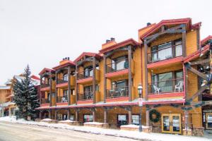 a large wooden building on the side of a street at Der Steiermark in Breckenridge