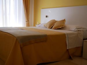 Postel nebo postele na pokoji v ubytování Donna Nicla B&B