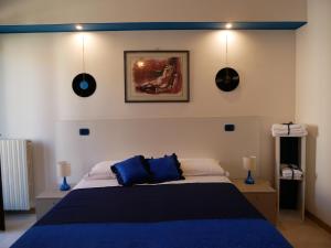 Postel nebo postele na pokoji v ubytování Donna Nicla B&B