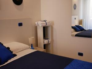 Postel nebo postele na pokoji v ubytování Donna Nicla B&B