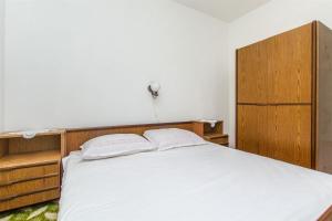 Postel nebo postele na pokoji v ubytování Apartments Jerka