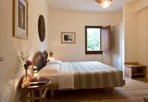 Postel nebo postele na pokoji v ubytování Cincinnato Wine Resort