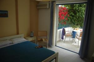 Postel nebo postele na pokoji v ubytování Portobelis Apartments