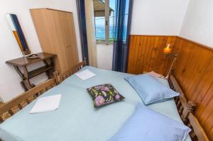 Postel nebo postele na pokoji v ubytování Apartment Ana