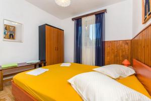 Postel nebo postele na pokoji v ubytování Apartment Ana
