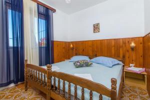 Postel nebo postele na pokoji v ubytování Apartment Ana