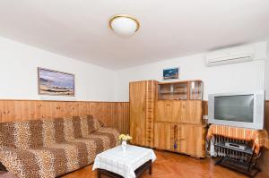 TV a/nebo společenská místnost v ubytování House Laura