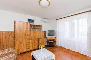 TV a/nebo společenská místnost v ubytování House Laura