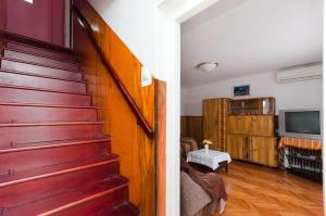 TV a/nebo společenská místnost v ubytování House Laura