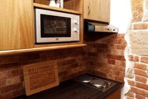 Kuchyňa alebo kuchynka v ubytovaní Apartments & Suites Žlutá Hruška