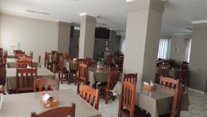 מסעדה או מקום אחר לאכול בו ב-Presidente Hotel