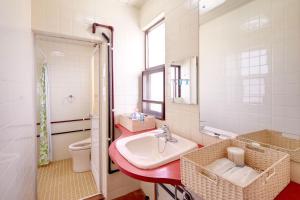 Vonios kambarys apgyvendinimo įstaigoje Condominium Aoi Sanmyaku