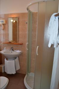 a bathroom with a shower and a sink at Albergo Italia in Varallo