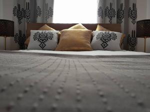Łóżko lub łóżka w pokoju w obiekcie Apartament Krupówki Centrum