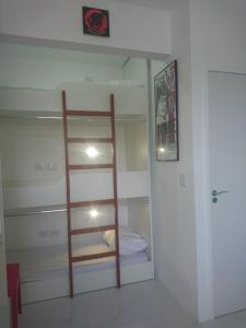 Cama ou camas em um quarto em Galinha d'Angola