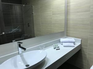 Koupelna v ubytování Arame Hotel