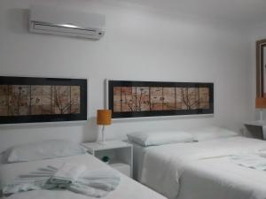 Postel nebo postele na pokoji v ubytování Pousada Emcanto