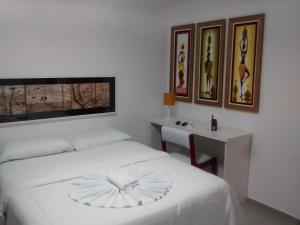 Posteľ alebo postele v izbe v ubytovaní Pousada Emcanto