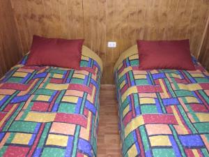 Cama o camas de una habitación en Cabañas las Bandurrias