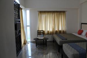 Posezení v ubytování Hotel Jaidharshini Palace