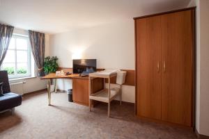 TV a/nebo společenská místnost v ubytování Hotel Reussischer Hof