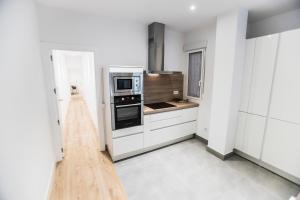 A cozinha ou cozinha compacta de Moncloa Luxury