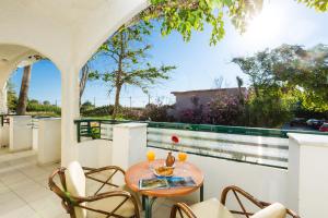 A balcony or terrace at Trefon Hotel Apartments and Family Suites