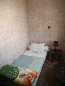 Postel nebo postele na pokoji v ubytování Hotel Coeur de Mogador