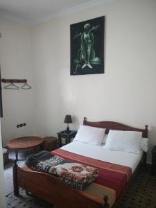 Postel nebo postele na pokoji v ubytování Hotel Coeur de Mogador