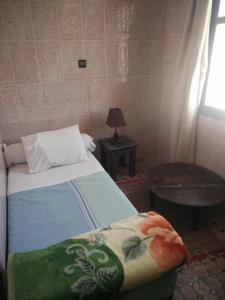 Postel nebo postele na pokoji v ubytování Hotel Coeur de Mogador