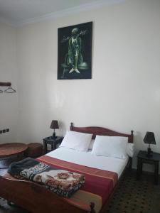 Postel nebo postele na pokoji v ubytování Hotel Coeur de Mogador
