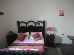 Postel nebo postele na pokoji v ubytování Hotel Coeur de Mogador