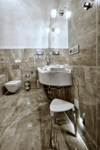 Kúpeľňa v ubytovaní Hotel Grand
