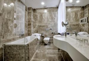 Kúpeľňa v ubytovaní Hotel Grand