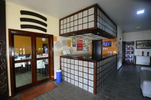 Kuchyň nebo kuchyňský kout v ubytování Hotel Monte Pascoal