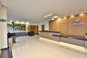 a lobby of a hospital with a waiting room at Comfort Mogi Guaçu in Mogi-Guaçu +177 photos