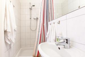 Ванная комната в Süßes 1-Zimmer-Apartment in Kollwitzplatz-Nähe