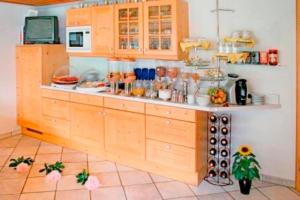 a kitchen with a counter with food on it at Haus Sonnbühel in Brand