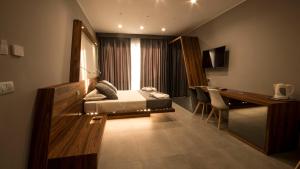 A television and/or entertainment centre at B&B Rakel Home