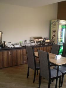 Kuchyň nebo kuchyňský kout v ubytování New Hotel