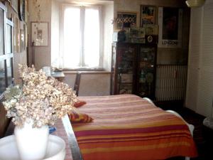 Postel nebo postele na pokoji v ubytování B&B Il Torchio