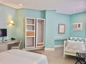 Uma cama ou camas num quarto em Hotel Lorenza