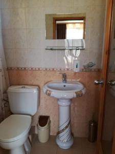 Ванная комната в Guest Rooms Grachenovi