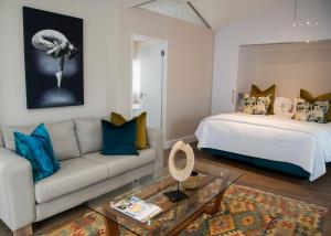 Postel nebo postele na pokoji v ubytování Turbine Hotel & Spa