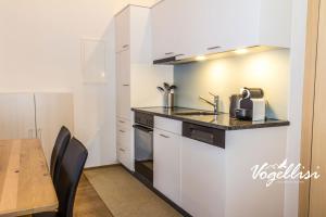 Kuchyň nebo kuchyňský kout v ubytování Hotel Bären