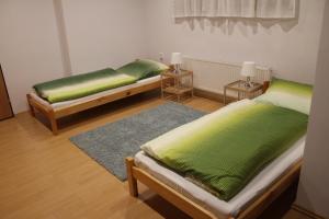 Postel nebo postele na pokoji v ubytování Apartmán v dobré lokalitě