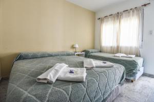 Ένα ή περισσότερα κρεβάτια σε δωμάτιο στο Hotel Acantilado